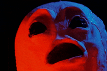 a close up of a person 's face with glowing eyes