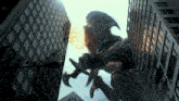 a monster is flying through the air between buildings
