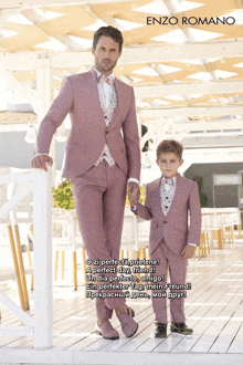 a man in a pink suit holds the hand of a young boy