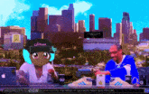 snoop dogg and a girl are sitting at a table with a city in the background