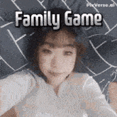a woman laying on a bed with the words family game written on the bottom