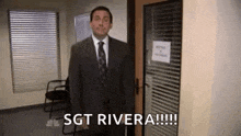 a man in a suit and tie is standing in front of a door and says `` sgt rivera !!! '' .