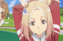 a girl in a red and white jacket with the number 0 on it