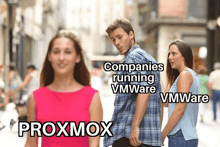 a man and a woman are walking down a street with the words companies running vmware and proxmox on the bottom