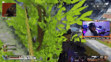 a man is playing a video game called apex legends with a microphone