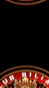 a blurry image of a spinning wheel with a red background