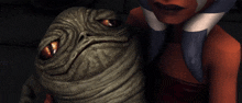 a close up of a cartoon character holding a creature with big eyes
