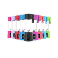 four different colored portable small juice extractors are sitting on a wooden table