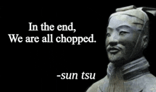 a statue with a quote from sun tsu