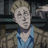a man in a plaid jacket and blue shirt looks tired