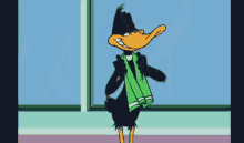 a cartoon duck with a green scarf around his neck is standing in front of a window