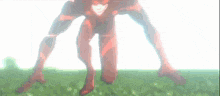 a man in a red superhero suit is standing in the grass .