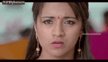 a close up of a woman 's face with a caption that says brahmanadam