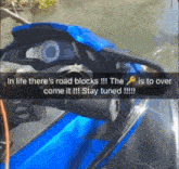 a blue jet ski with the caption in life there 's road blocks