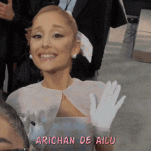 arichan de ailu is written in pink on a picture of a woman