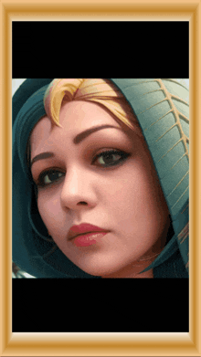 a picture of a woman with a scarf around her head