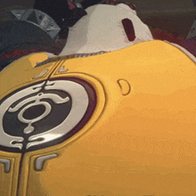 a close up of a person 's back with a circle on it that says ' s ' on it