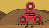 a cartoon drawing of a fidget spinner with a desert background