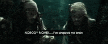 two pirates are standing next to each other with the words nobody move i 've dropped me brain