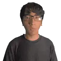 a man wearing glasses and a black shirt with the name mohammad on it