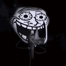 a cartoon troll face is holding a gun in his mouth