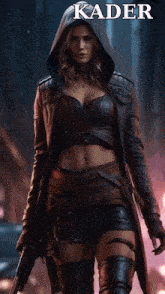 a woman in a hooded jacket is holding a gun with the word kader above her