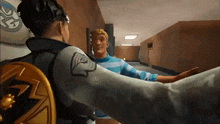 a man in a blue and white striped sweater is talking to another man