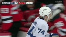 a hockey player wearing the number 74 jersey