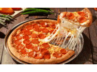 a pepperoni pizza with cheese being taken out of it