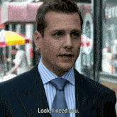 a man in a suit and tie is saying " look i need you "