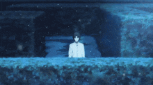 a man is surrounded by white feathers in a blue light
