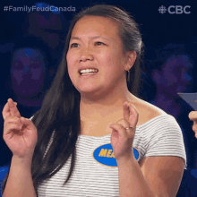 Fingers Crossed Meagan GIF - Fingers Crossed Meagan Family Feud Canada GIFs