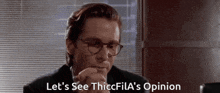 a man wearing glasses is saying let 's see thiccfila 's opinion