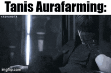 a black and white photo of a man with the words " tanis aurafarming " on the bottom