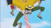 a man in a yellow shirt is holding a pink rope and says let me go