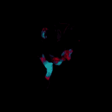 a close up of a person 's face with a rainbow of colors on it