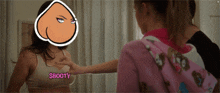 a woman wearing a bra that says $booty on it