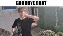 a man wearing glasses and a black shirt is making a hand gesture with the words goodbye chat below him
