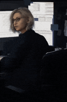 a woman with a fbi badge on her shoulder