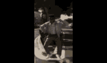 a blurry picture of a man standing on a sidewalk