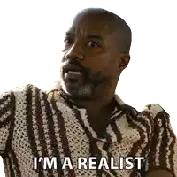 a man says i 'm a realist in a striped shirt