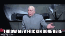Throw Bone Dr Evil GIF - Throw Bone Dr Evil Austin Powers GIFs