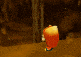 a cartoon squirrel is standing on a rock in a cave .