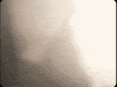 a close up of a white screen with a blurred background