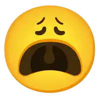 a yellow smiley face with its mouth open and a tear coming out of it