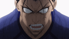 a close up of a man 's face with an angry expression