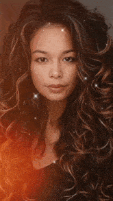 a woman with long curly hair is surrounded by circles