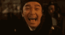 Stephen Chow Laughing Hysterically GIF