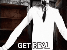 a man in a white suit and tie is standing in front of a shelf with the words get real written on it .