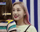 a girl with pink hair wearing a shirt that says " acts like meme "